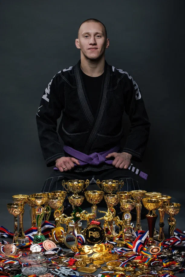 Nesterov Kirill with medals and cups of bjj